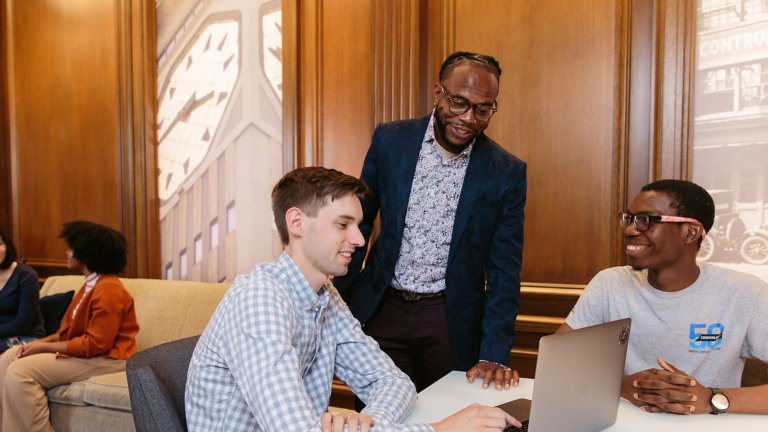 A group of Rockwell employees collaborate on a project in the lobby of our headquarters building in Milwaukee.