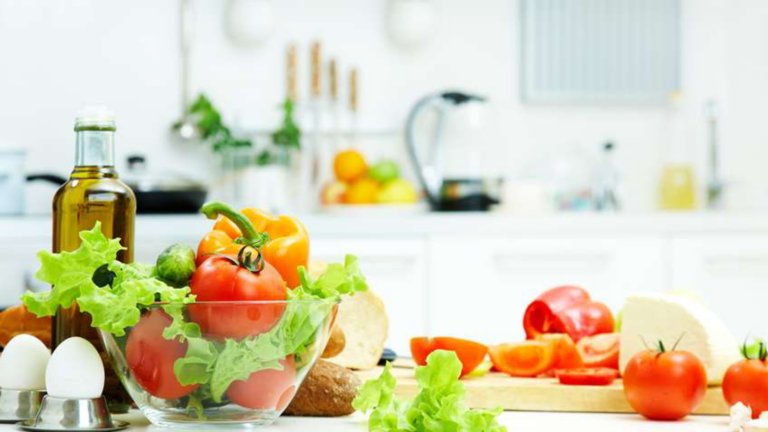 vegetables on a table in the kitchen