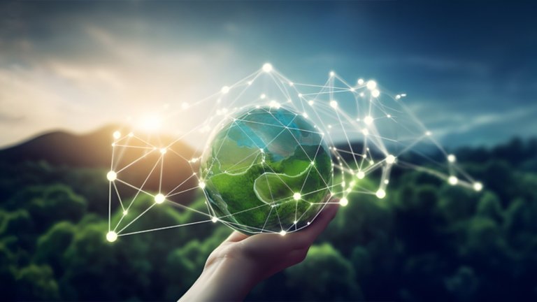 hand holding globe with network overlaid against forest and mountain landscape background